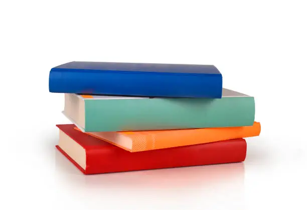 Photo of color books stack isolated