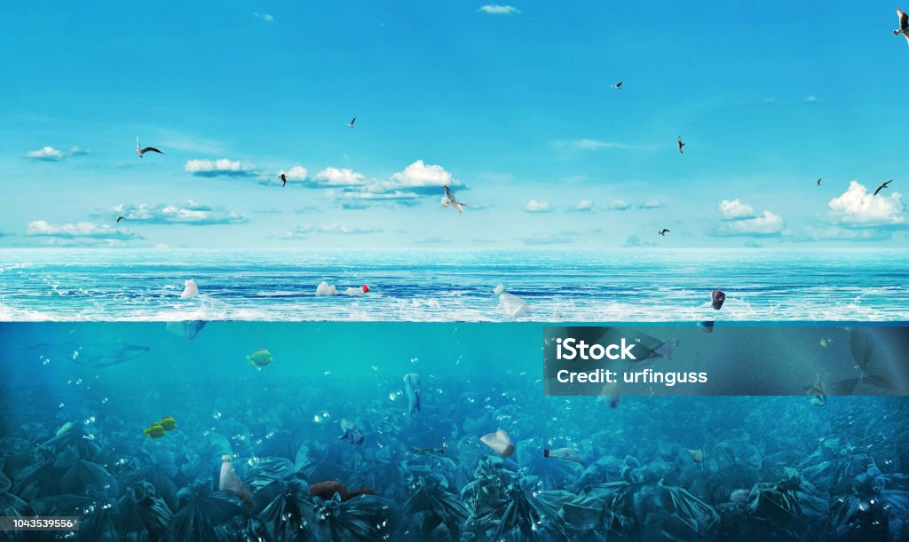 concept of global pollution. The sea full of garbage on the background of nature. Save the planet. Sea Stock Photo