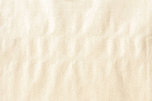 istock Brown crumpled paper texture 1043539634