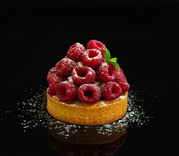 istock sand tartlet with raspberries. 1043551006