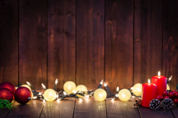 istock Wooden table with Christmas lights background 1043554520