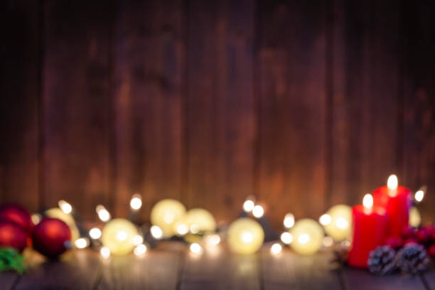 istock Blurred wooden table with Christmas lights background 1043554732