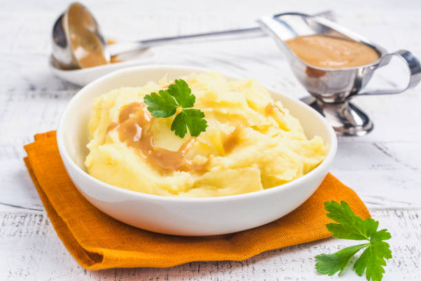 istock Mashed potatoes with gravy sauce 1043557176