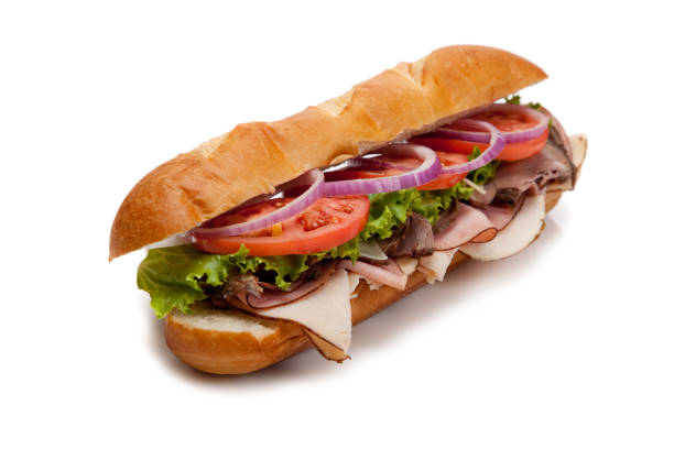 istock Toasted panini with ham, cheese and arugula sandwich on cutting board 1043558078