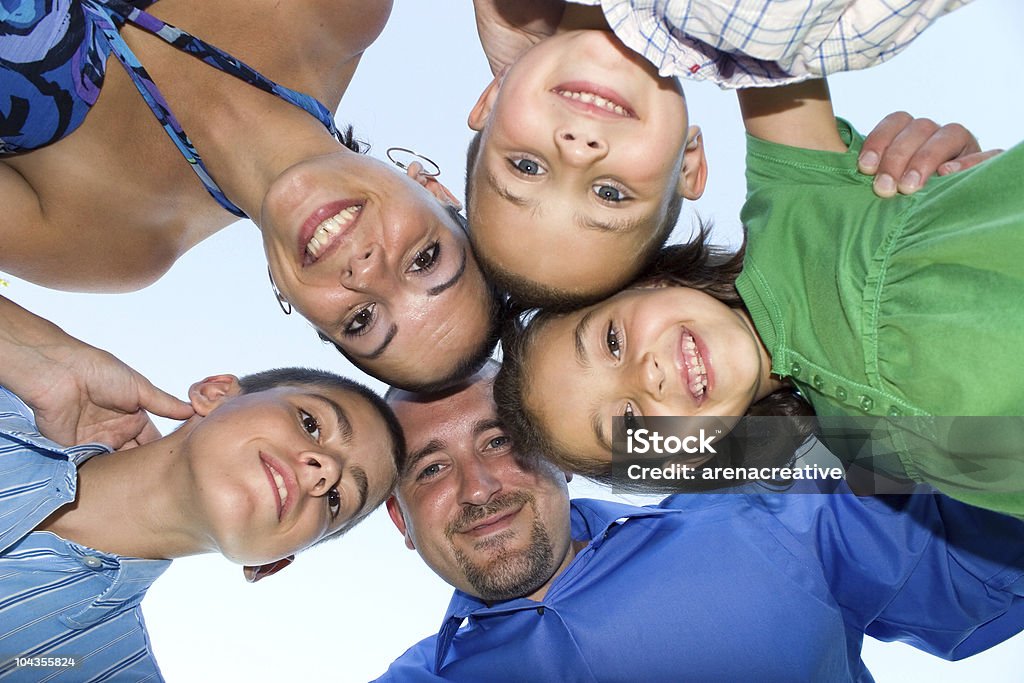 Happy Family Huddle  Cheerful Stock Photo