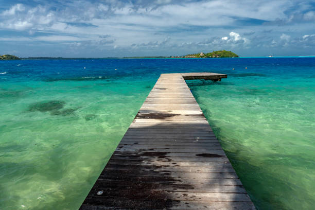 istock jetty bora bora french polynesia blue lagoon turquoise crystal water 1043561714