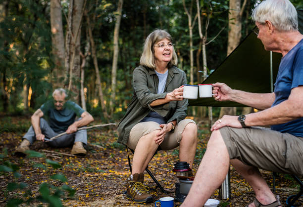 istock Friends having coffee at a campsite 1043562046