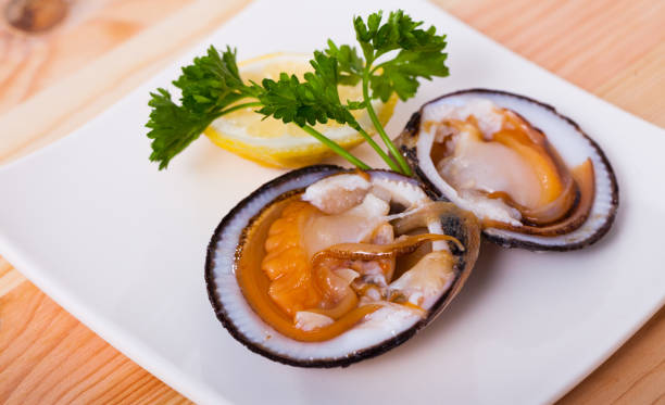 istock Fresh bivalve mussels with lemon 1043565466