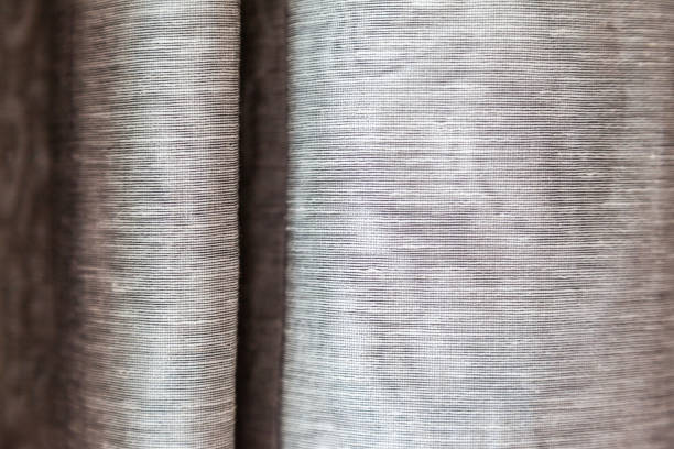 istock Beige curtains at the windows 1043565800