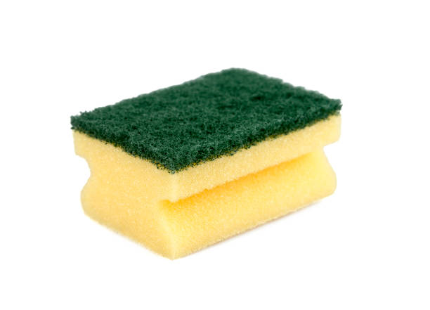 istock A kitchen sponge isolated on the white background 1043573642