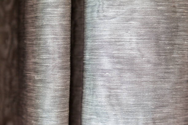 istock Beige curtains at the windows 1043576792