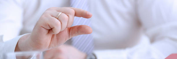 istock Male arms articulating during conference 1043580822