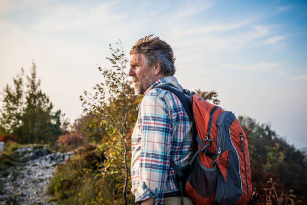 istock Senior Hiker Man Outdoors in the Mountains 1043581034