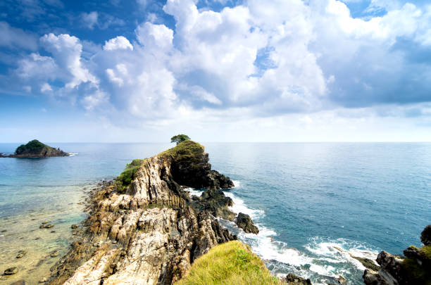 istock Beautiful tropical beach at sunny day with blue sky background 1043585234