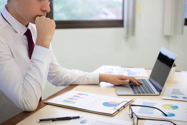 istock Businessman analyse investment marketing data. 1043589612