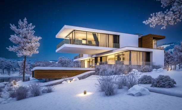 istock 3d rendering of modern house by the river in winter night 1043590138