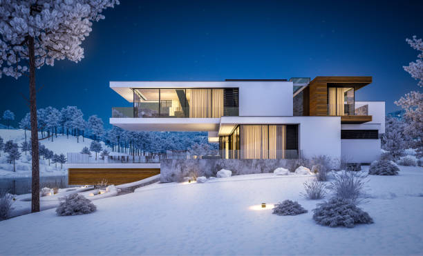 istock 3d rendering of modern house by the river in winter night 1043590140