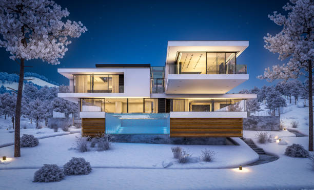 istock 3d rendering of modern house by the river in winter night 1043590230