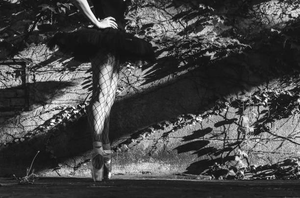 istock Ballerina posing outdoors 1043593904