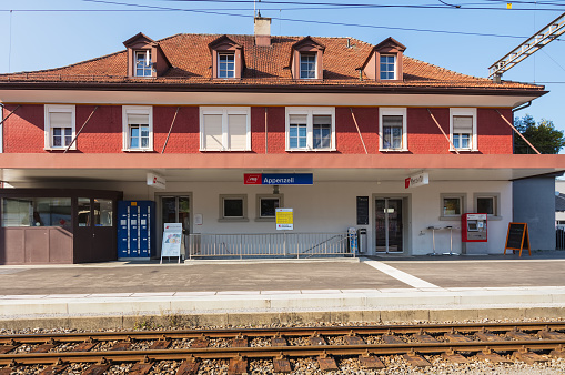 Appenzell, Switzerland - September 20, 2018: building of the railway station of the Appenzeller Bahnen in the town of Appenzell. The Appenzeller Bahnen is a Swiss railway company operating a network of railways in the Swiss cantons of Appenzell Innerrhoden, Appenzell Ausserrhoden and St. Gallen, headquartered in the town of Herisau. Appenzell is the capital of the Swiss canton of Appenzell Innerrhoden.
