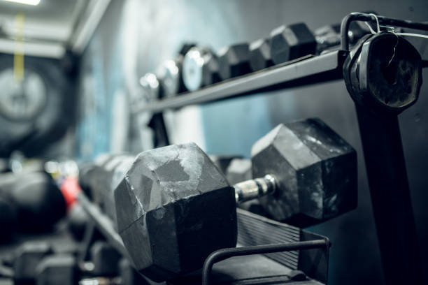 istock Dumbbells on Stand in Gym 1043608142