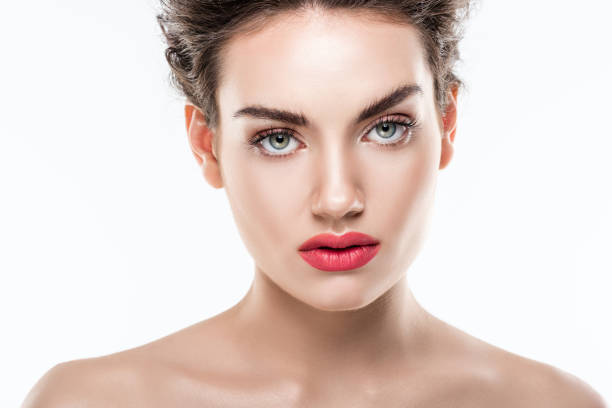 portrait of beautiful model with pink lips, isolated on white retrato de la hermosa modelo con labios rosados, aislado sobre fondo blanco