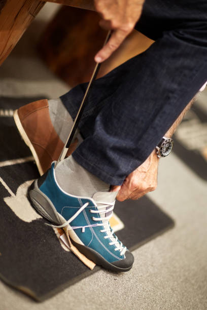 istock Trying hiking shoes 1043609714