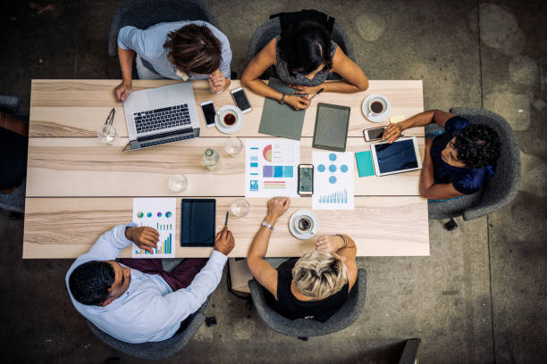 istock Group of financial professionals analyzing markets 1043614010