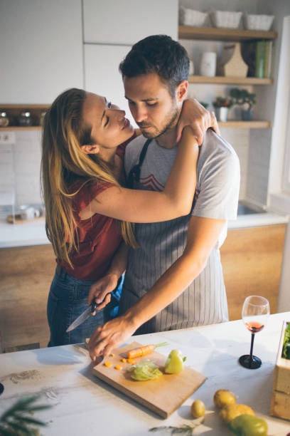 istock Young couple prepaid food in kitchen 1043617126