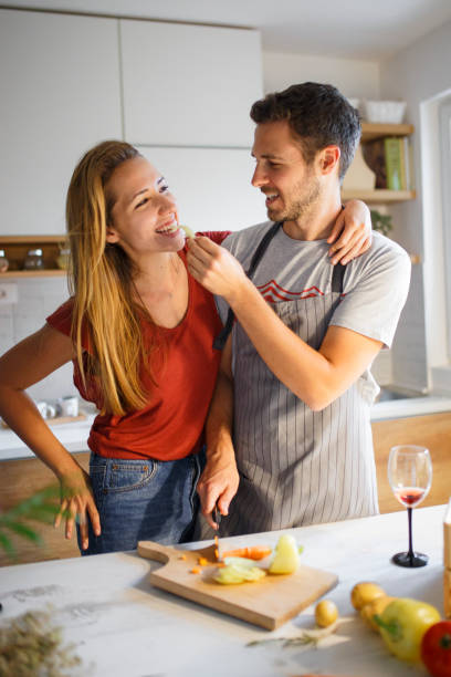 istock Young couple prepaid food in kitchen 1043617728
