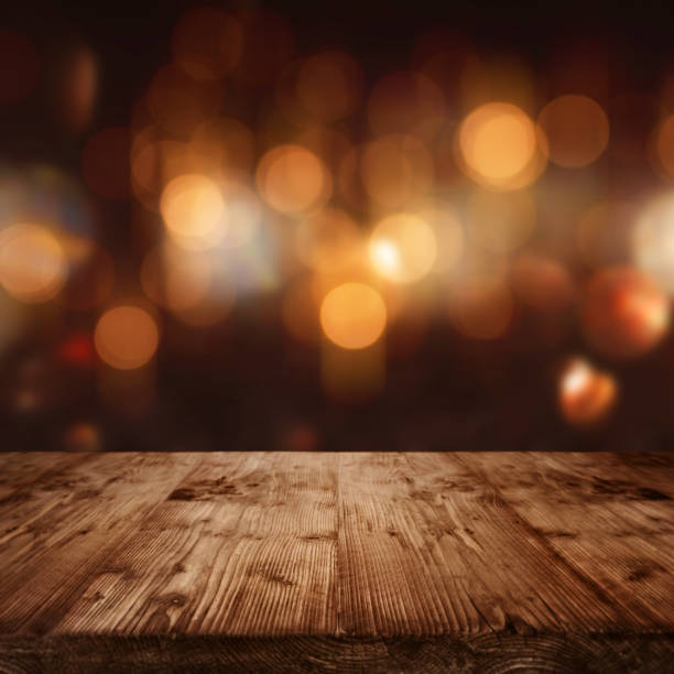 istock Celebratory bokeh background with wooden stage 1043617802