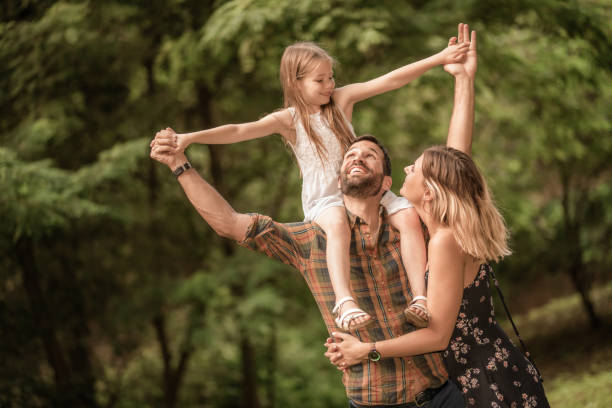 istock Young family having fun outdoors. 1043629574