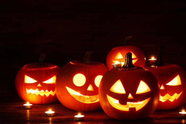 istock Halloween pumpkin and candles 1043630218