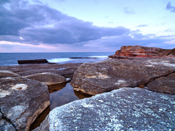 istock long exposure landscaped with amazing clouds and rocks 1043632866