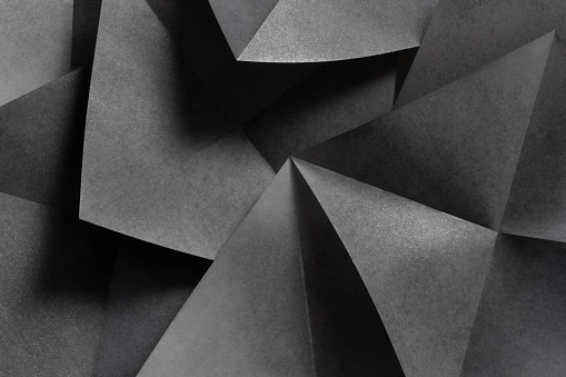 Macro image of geometric shapes of paper, three-dimensional effect, abstract background