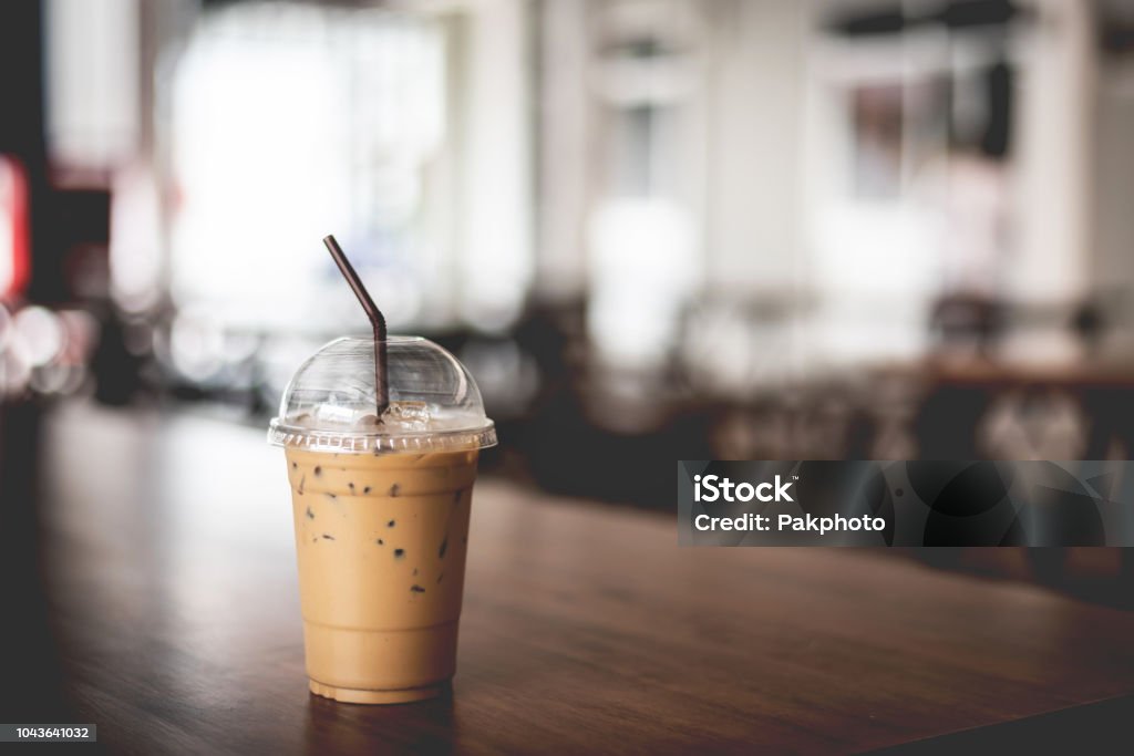 Iced espresso on the wooden table with nature light background Iced espresso on the wooden table with nature light background, Iced coffee and space background Bar Counter Stock Photo