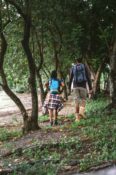 istock Couple trekking in a forest 1043644096