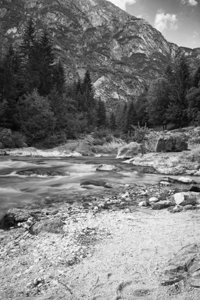 istock Cold pure Soca river great gorge canyons in black and white, Slovenia 1043647396