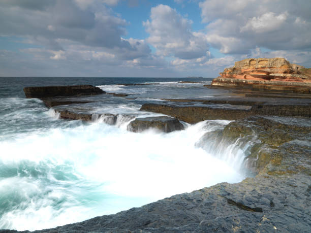 istock long exposure shot with beautiful sea and rocks 1043647406