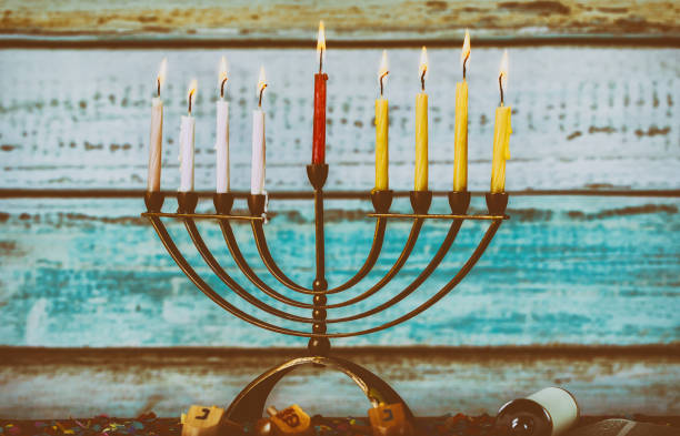 istock A fully lit menorah Glowing Hanukkah Candles 1043648528