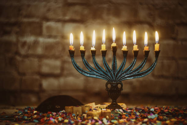 jewish ritual holiday hanukkah menorah traditional burning candles - candle hanukkah menorah candlelight imagens e fotografias de stock