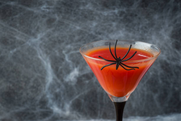 istock Bloody Mary cocktail, spider web background for Halloween, selective focus Copy space 1043652562