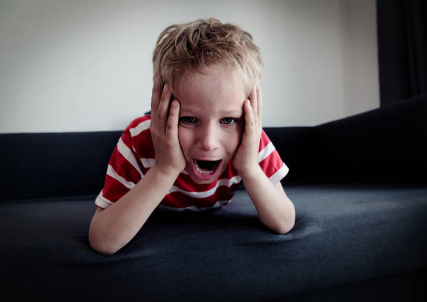 istock agressive angry conflict child exhausted tired overload 1043652646