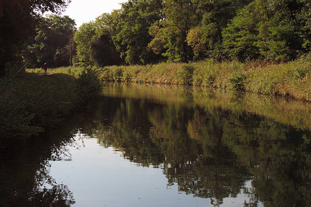 istock Solitary Hiker Along Canal 104365803