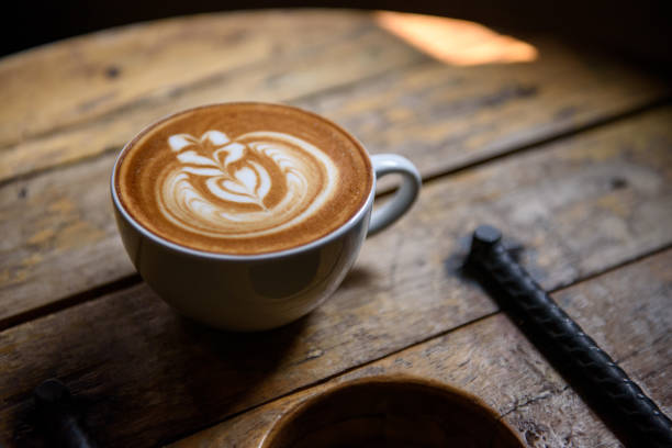 istock Coffee latte on wooden table 1043661594