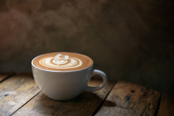 Coffee latte on wooden table