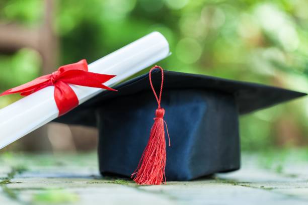 istock Graduation hat and diploma. 1043668626
