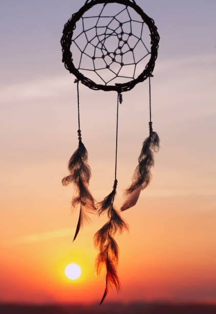 istock Catcher dreams on the orange sunset. 1043673048