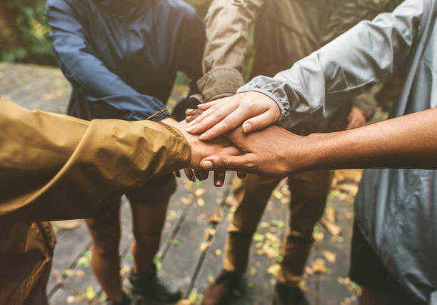 istock Hands join outdoor together 1043673972