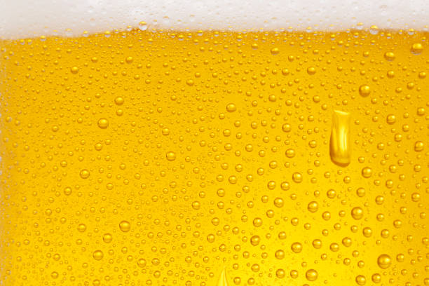 istock Beer Background. Ice Cold Beer Glass With Water Drops Condensation 1043680686